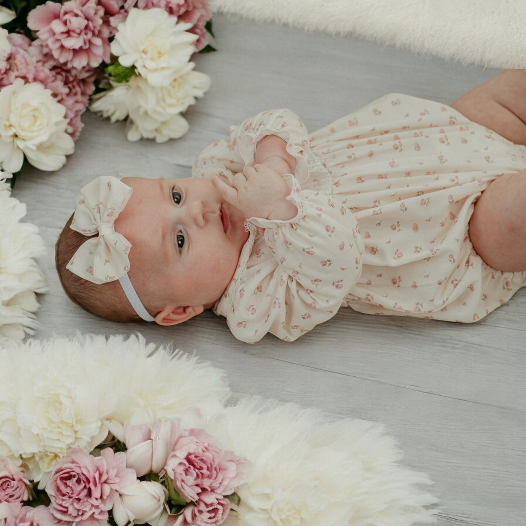 Pink and white romper on sale